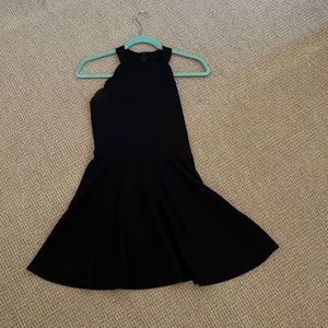 Black dress with scalloped shoulders from Sallymiller Couture